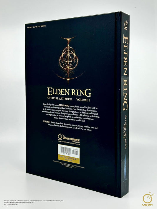 The back cover and spine of the Elden Ring Official Art Book Volume I, featuring a dark navy blue background with gold text and the Golden Compass emblem, photographed on a light gray background.
