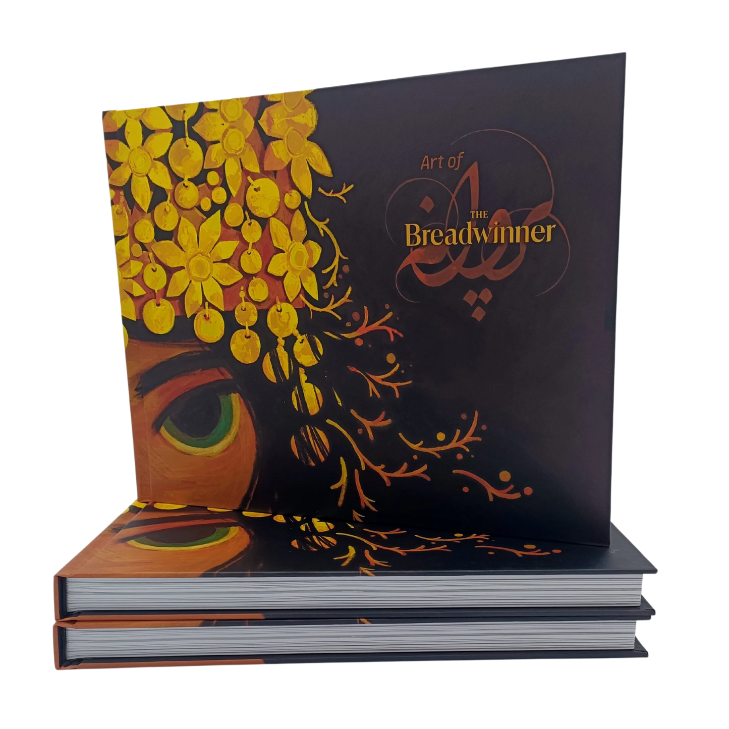Hardcover "Art of The Breadwinner" book cover standing upright, featuring intricate golden floral headpiece artwork and the film title.