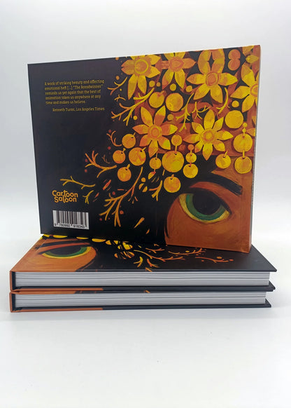 Back cover of "Art of The Breadwinner" hardback book by Cartoon Saloon, showing the ISBN barcode and artistic floral illustration.