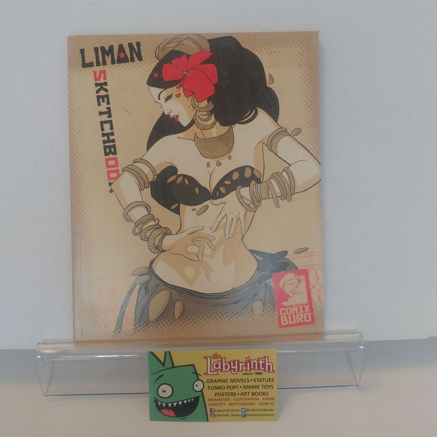 A limited edition sketch art book titled 'LIMAN Sketches' featuring a sketch of a girl on the cover. The book is signed and indicates it is a collector's item.