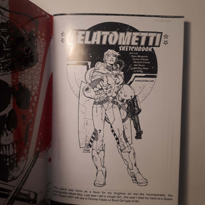An open sketchbook showing a black-and-white page titled 'GELATOMMETI SKETCHBOOK' with a line drawing of a futuristic armored figure, photographed against a light background.
