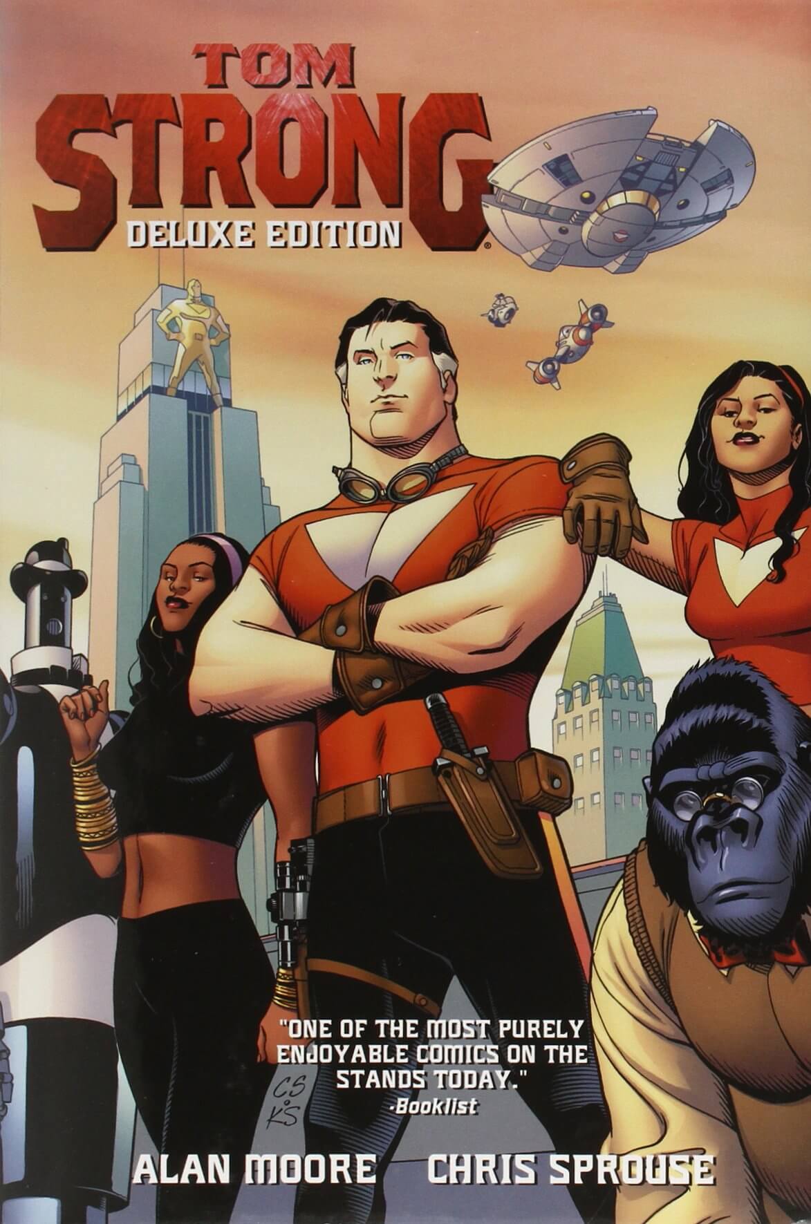 Cover of the 'Tom Strong Deluxe Edition Vol. 1 Hardcover' featuring a group of characters from the comic book, with the main character, Tom Strong, in a prominent red costume, surrounded by supporting characters in various costumes and a gorilla in the foreground.