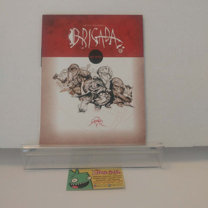 A sketchbook titled 'Brigada' by Enrique Fernandez, featuring a red and black cover with sketches of fan