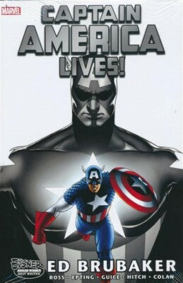 Front cover of the Marvel comic book 'Captain America Lives!' by Ed Brubaker, featuring a large black-and-white portrait of Captain America above a smaller full-color depiction of him in his blue, red, and white suit with a shield.