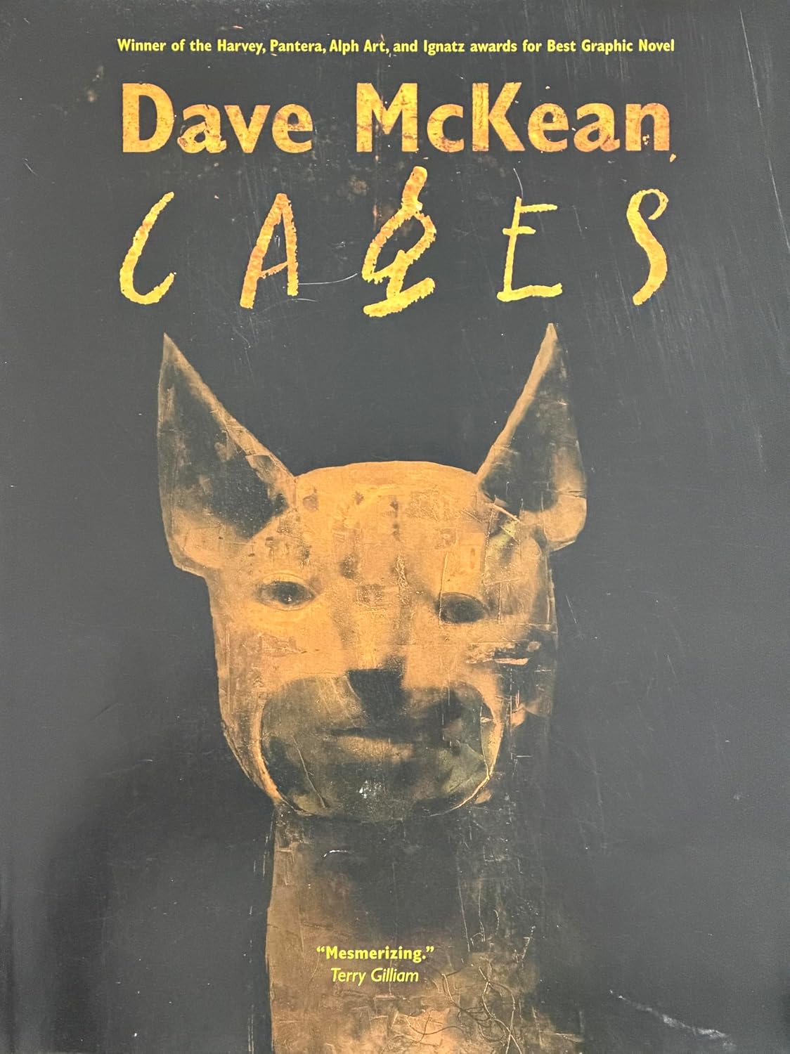 Book cover of 'Cages' by Dave McKean with a stylized animal head illustration on a dark background.