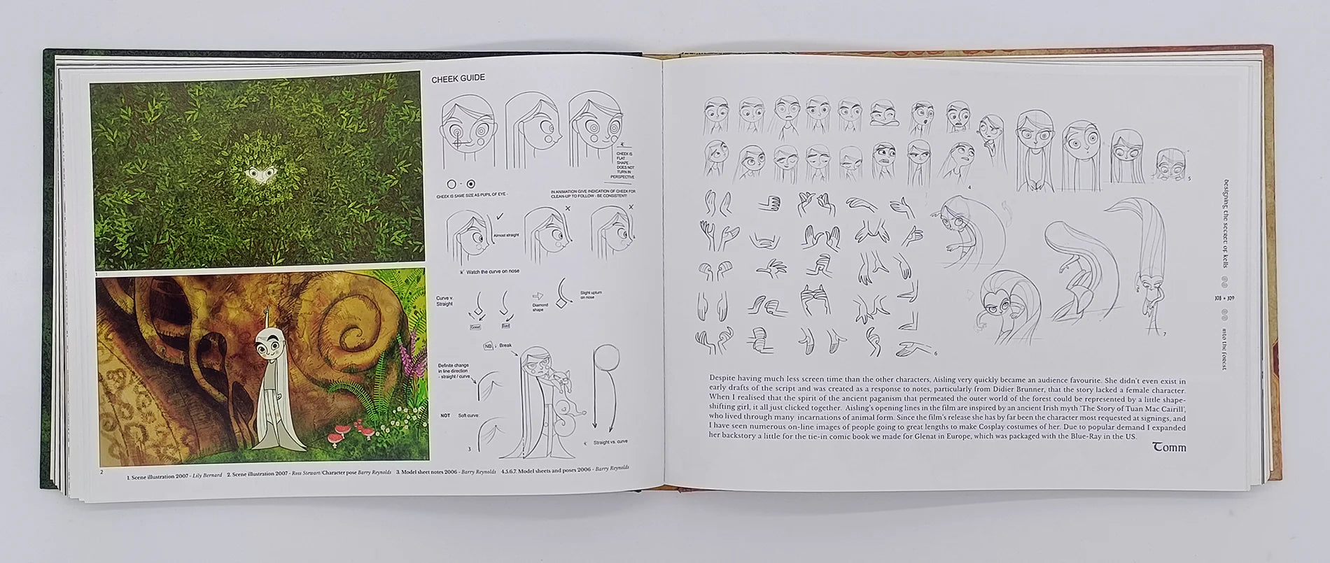 Open book showing illustrations and text on a white background