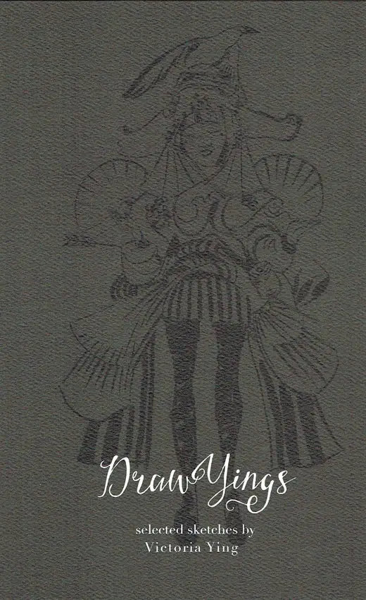 A square cover-style artwork featuring a monochrome line drawing of a stylized woman in flowing garments, with the title 'DrawYings' and smaller text 'selected sketches by Victoria Ying' on a dark textured gray background.