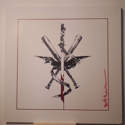 A square art print or poster featuring a black ink illustration of crossed swords and a snake wrapped around a vertical blade, set within a thin red border on a white background. A red signature or mark appears on the lower right side.