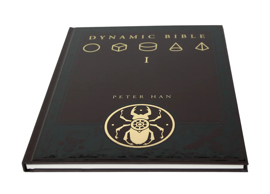 A hardcover book titled 'Dynamic Bible I' by Peter Han, featuring a glossy black cover with gold foil lettering and geometric symbols, shown on a plain white background.