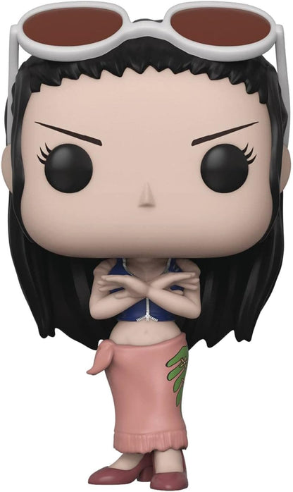 A Funko Pop! vinyl figure of a stylized anime character with black hair, large black eyes, and white-framed sunglasses on her head, wearing a blue top, pink skirt, and green leaf detail, shown against a plain white background.