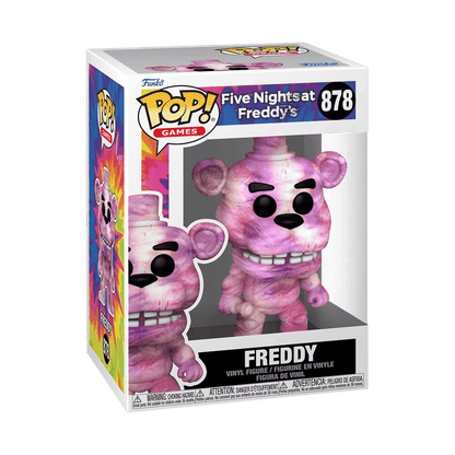 Funko Pop! Games vinyl figure of Freddy from Five Nights at Freddy's, number 878, in its original window box packaging. The figure is a pink and purple marbled or tie-dye style, with black eyes and a wide grin, set against a clean white background.