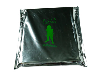 A square metallic silver pouch with a green soldier silhouette and the text '2018 watch collection' printed on the front, shown against a plain white background.
