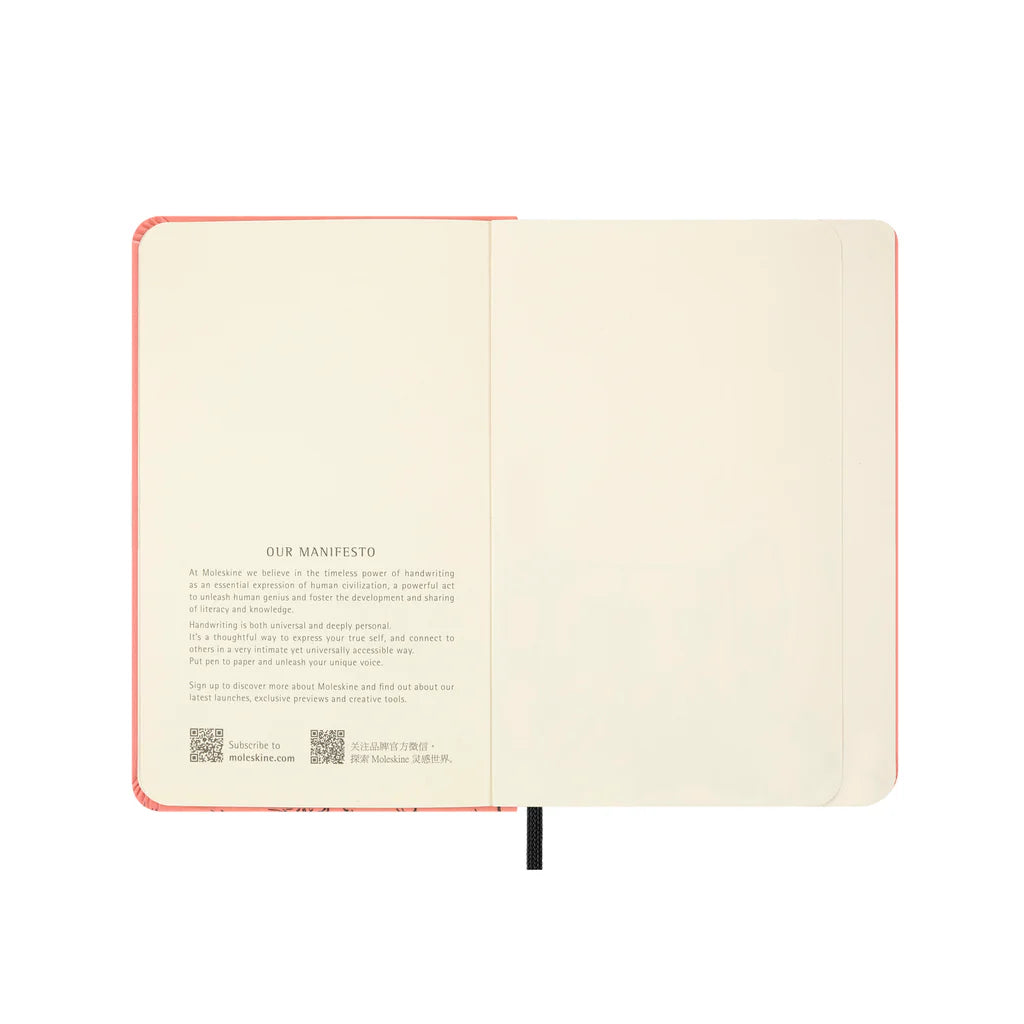 Open notebook with text and QR code on a white background