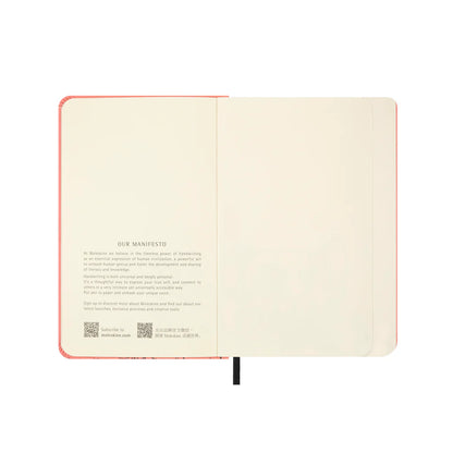 Open notebook with text and QR code on a white background