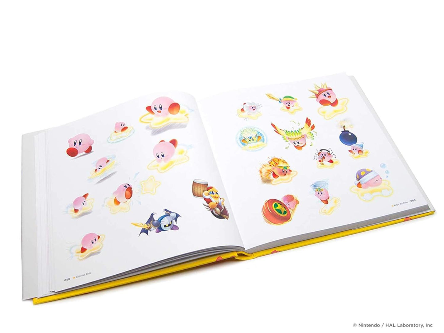 An open hardcover book featuring multiple colorful Kirby-themed sticker or character illustrations spread across both pages, photographed on a clean white background.