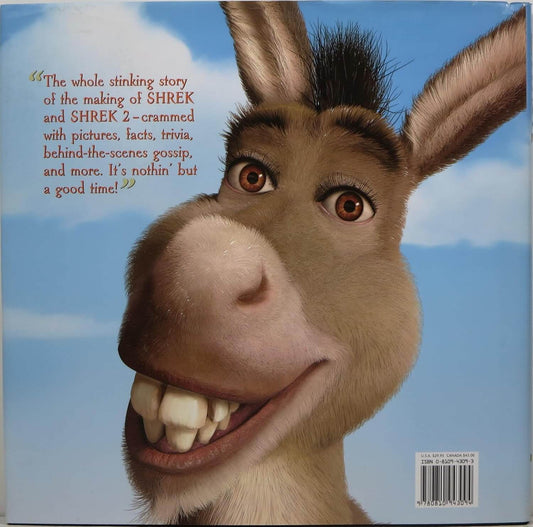 Back cover of a Shrek book featuring a large close-up of Donkey's face against a blue sky background, with a quote on the left and a barcode in the lower right corner.