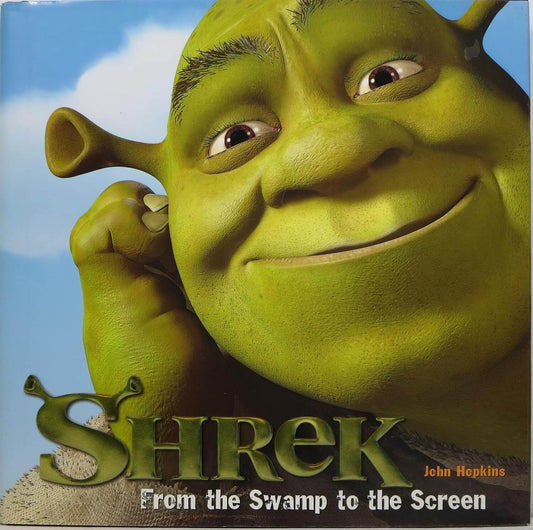 Book cover for 'Shrek: From the Swamp to the Screen' by John Hopkins, featuring a close-up of Shrek's face against a blue sky background with the title at the bottom.
