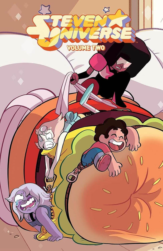Comic book cover for Steven Universe Volume Two, featuring characters Steven, Garnet, Amethyst, and Jack from the anime series Steven Universe riding on a giant hamburger bun in a playful, cartoon-style illustration.