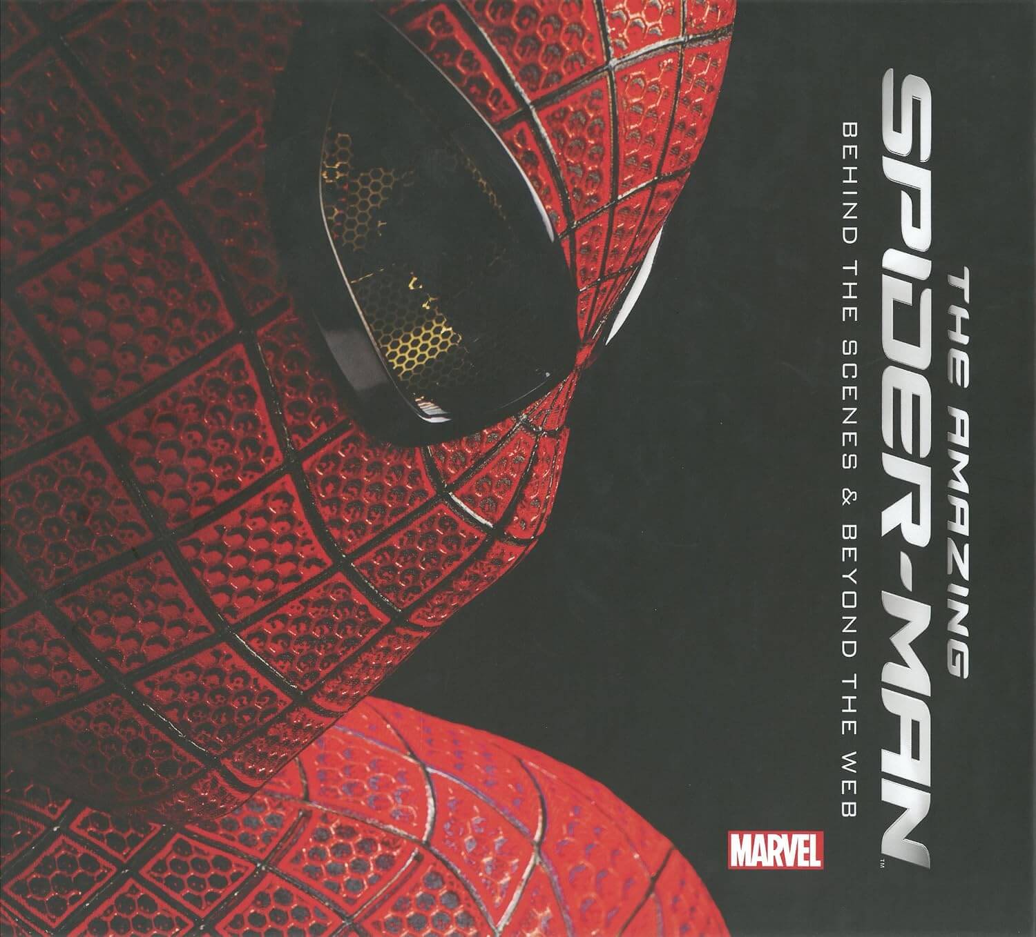 Close-up of Spider-Man's mask with 'The Amazing Spider-Man' text and Marvel logo on a black background