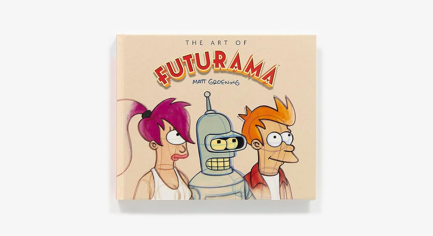 The Art of Futurama art book by Matt Groening, featuring a beige cover with colorful illustrations of Bender, Fry, and Amy in a clean studio shot.