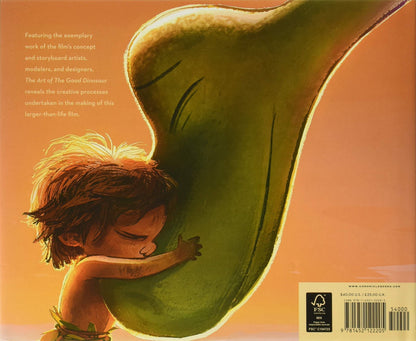 Back cover of the book 'The Good Dinosaur' featuring a warm orange background, an illustration of a young dinosaur hugging a giant green pear, and a barcode box in the bottom right corner.