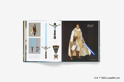 An open printed book or concept art booklet on a light gray background, showing multiple illustrated lightsabers and a character render on the right page. A small Lucasfilm copyright notice appears at the bottom right.