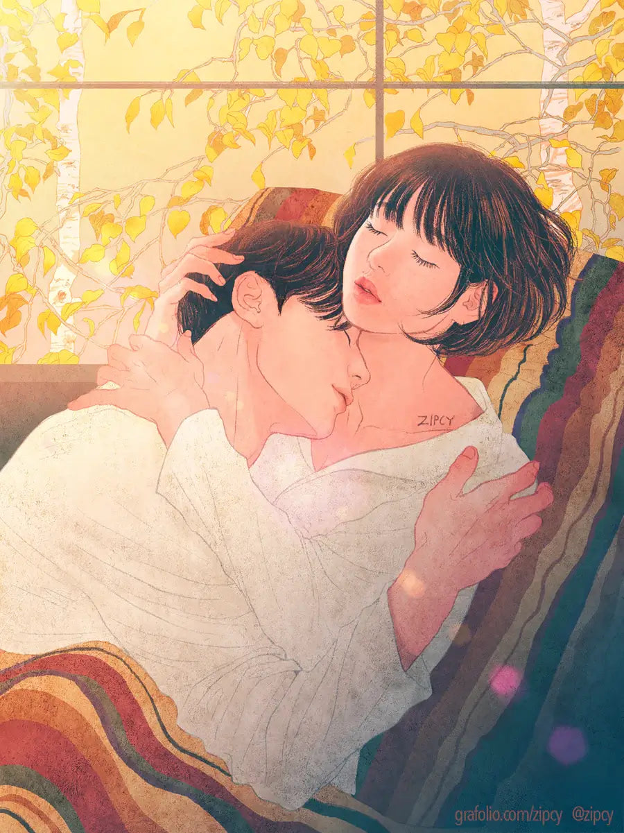 A zipcy illustration of a couple embracing and kissing, wrapped in a white blanket, with warm yellow autumn leaves and a striped cushion in the background.