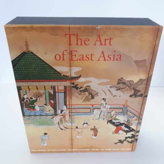 A slipcase containing two books on The Art of East Asia with traditional East Asian architectural illustrations on the cover.